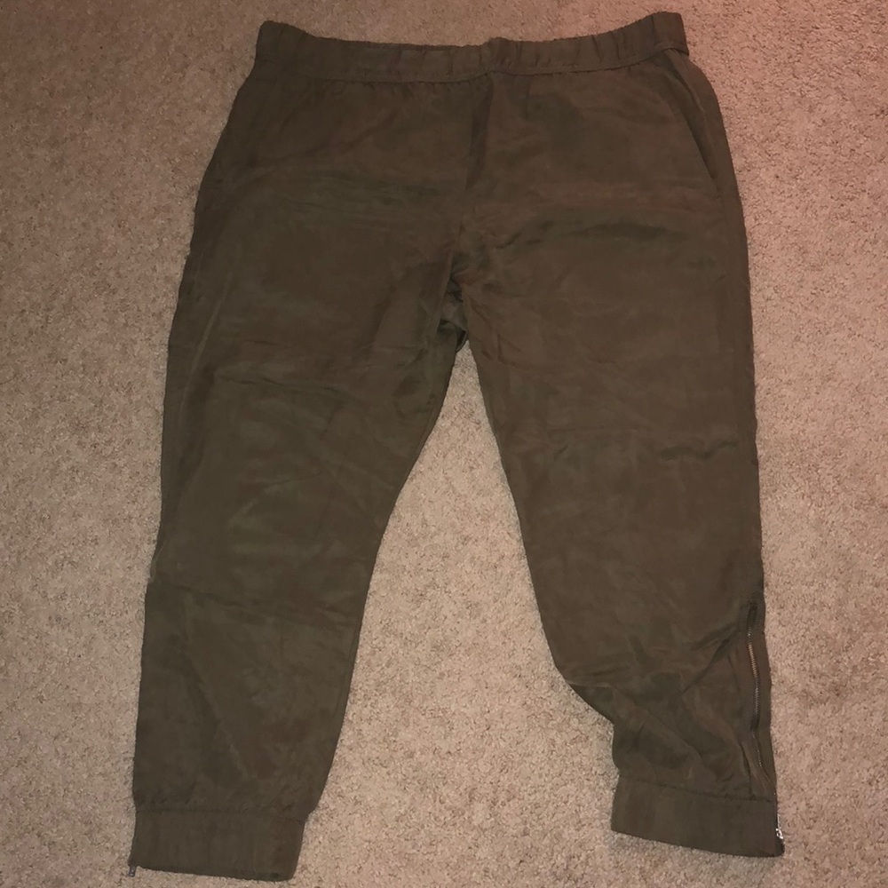 Green Gap joggers with ankle zippers